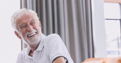 Man smiling with dentures