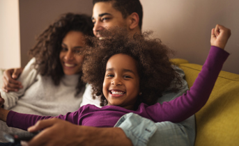 Happy family on the couch