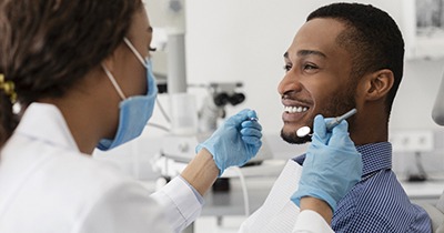 Man visiting dentist for dental bonding in Grafton