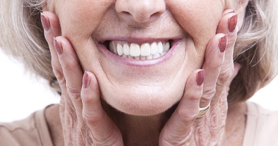 Closeup of woman’s smile with dentures in Grafton