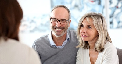 Couple learning about the cost of dentures in Grafton