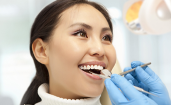 Woman receiving dental treatment